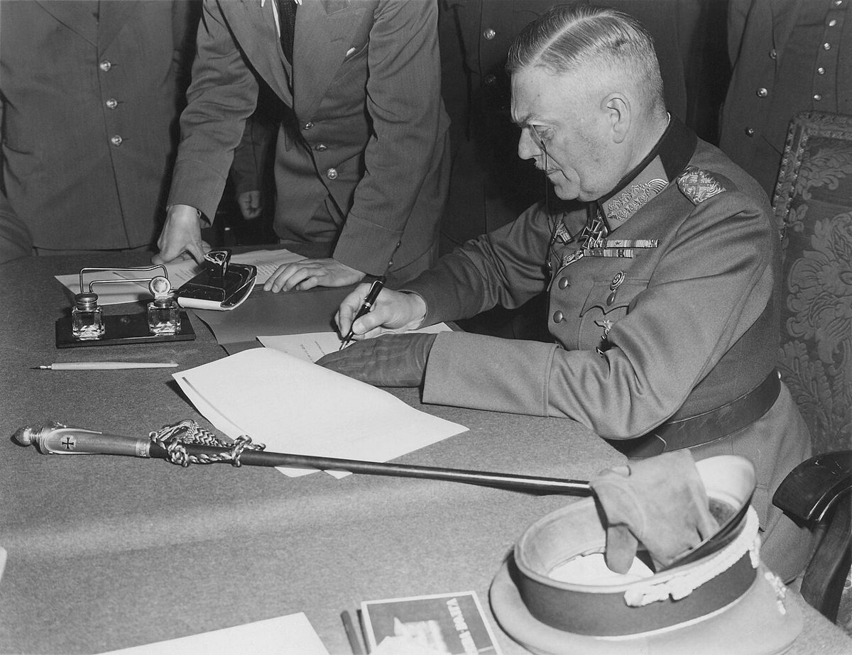 Field Marshal Wilhelm Keitel signs the surrender of the Wehrmacht, 8 May 1945.